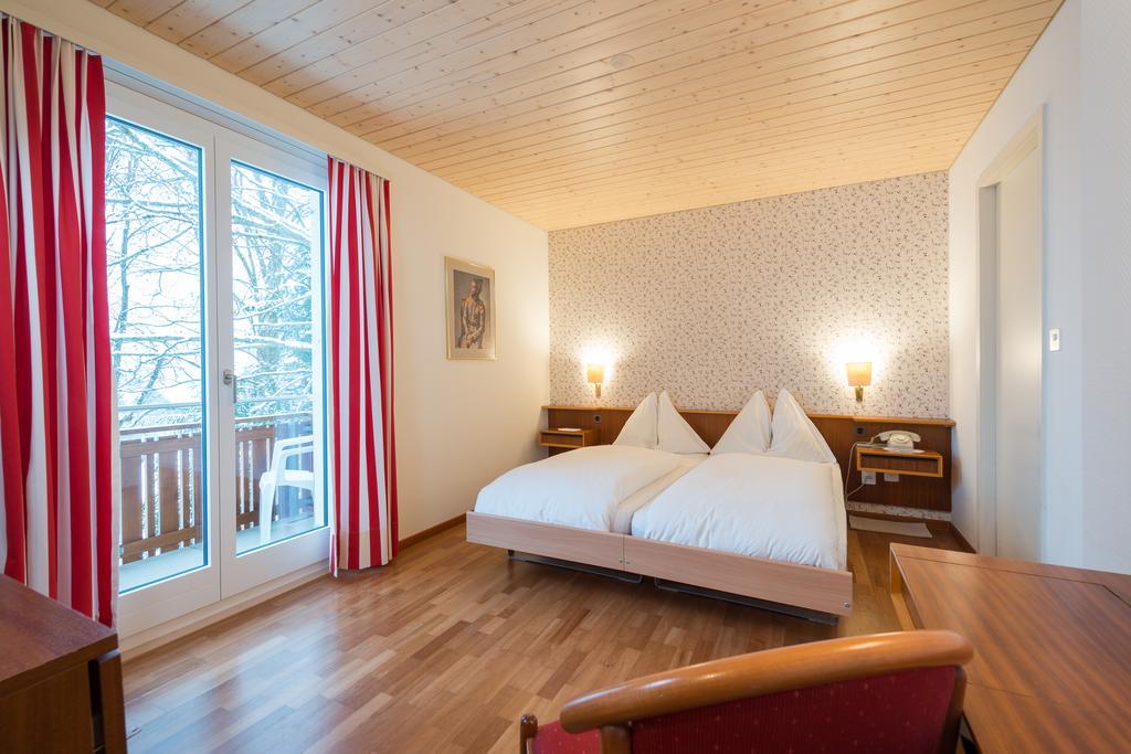 Hotel Berghaus Wengen Quarto foto