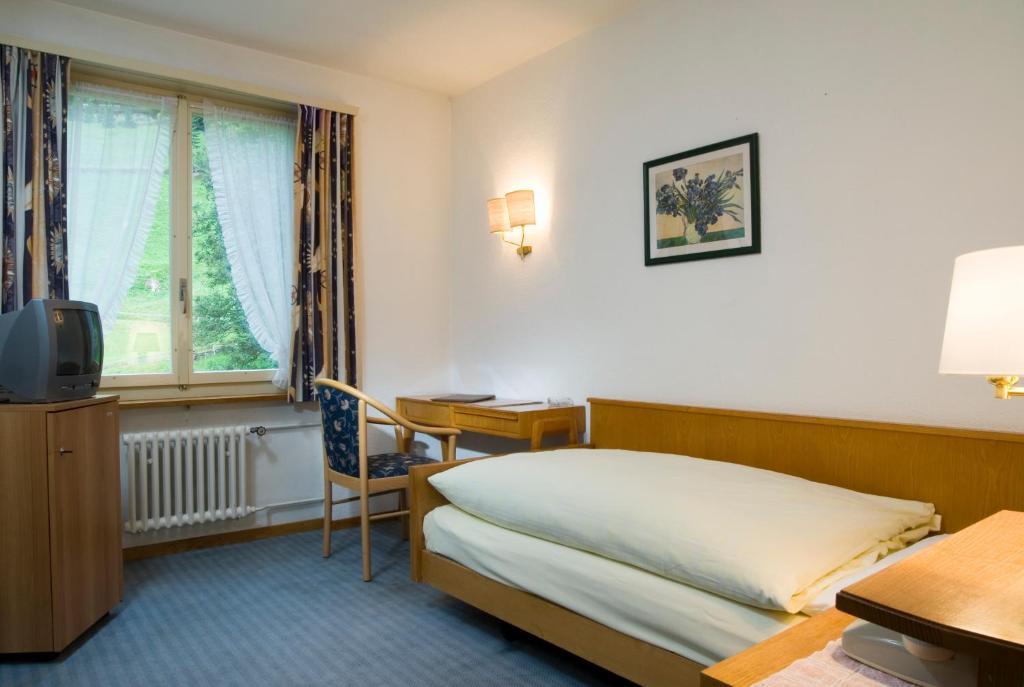 Hotel Berghaus Wengen Quarto foto